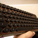 Illustration for article titled They Made A Compact Retro Keyboard Out Of Wood